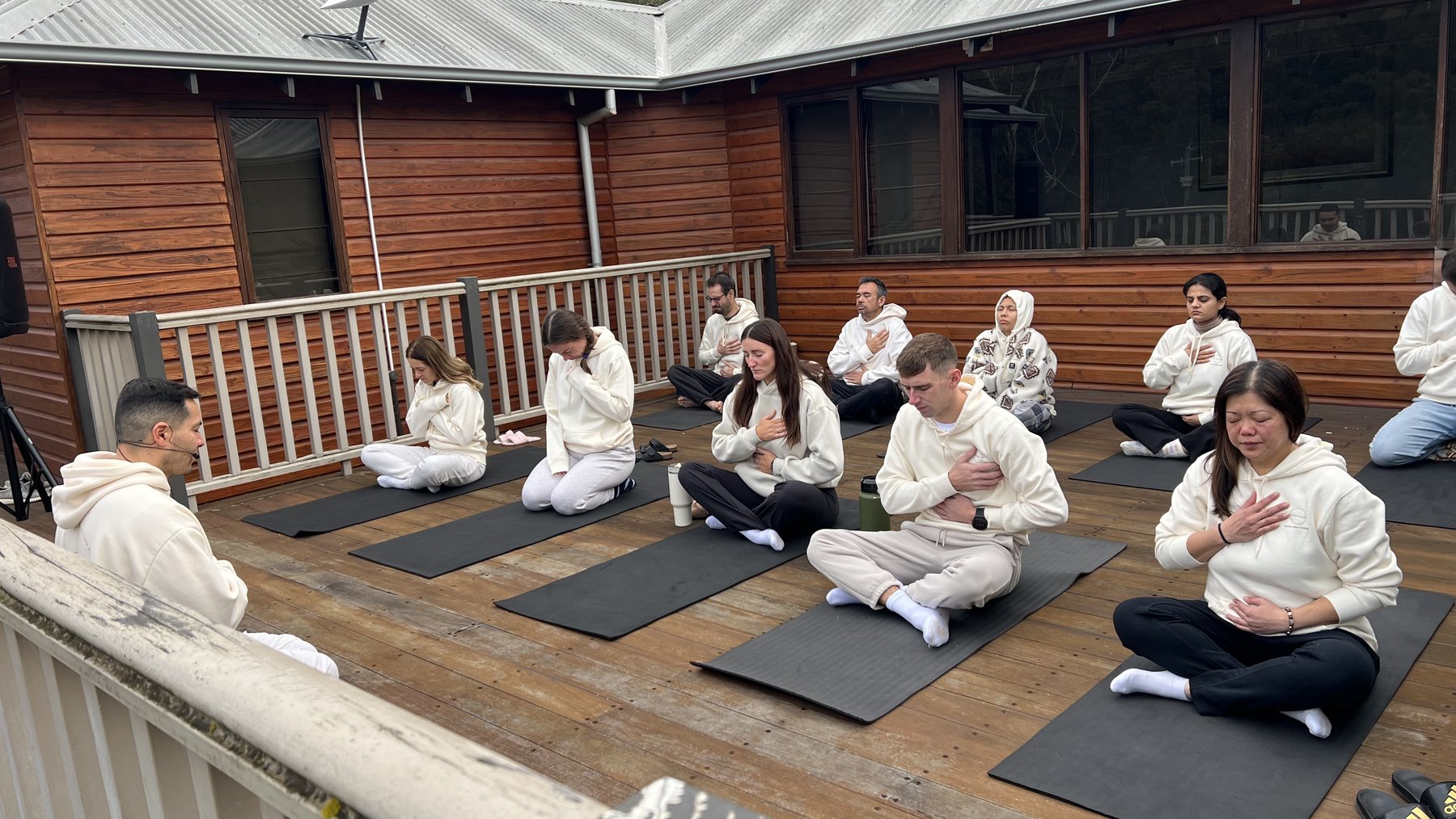 Morning meditation practice on the retreat deck